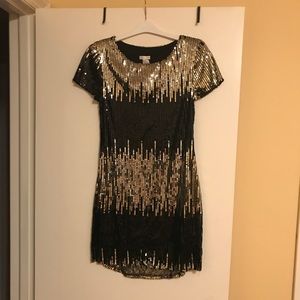 Black and gold sequin mini dress